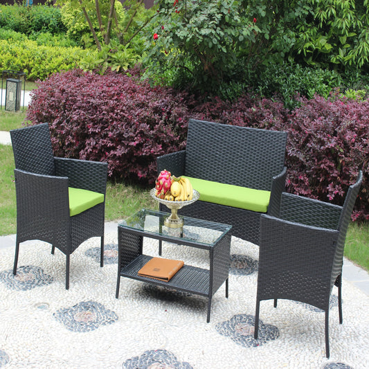 4-Piece Black Rattan Outdoor Garden Furniture Set with Green Cushions – Wicker Sofa and Glass Top Table