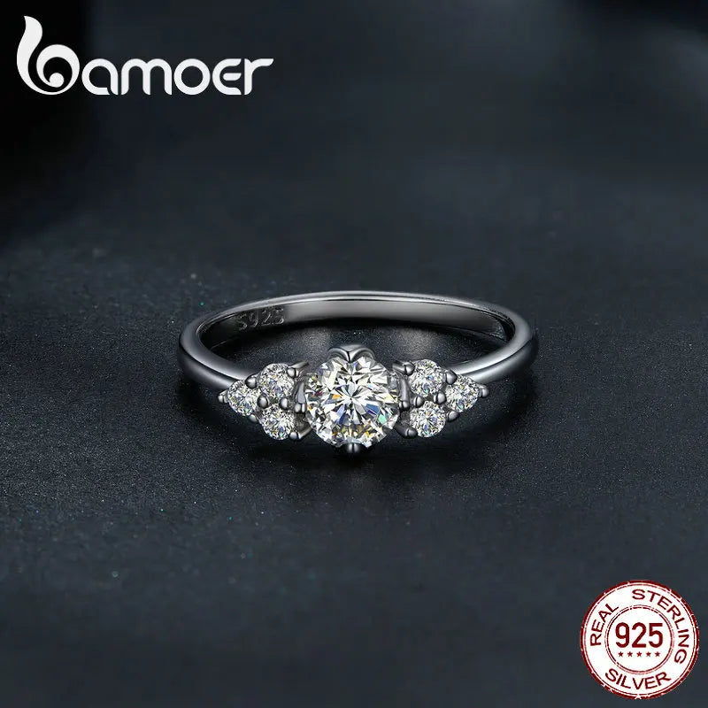 0.5 Carat Round Moissanite Engagement Ring – D Color VVS1 Stone with CZ Accents on 925 Sterling Silver Band for Women