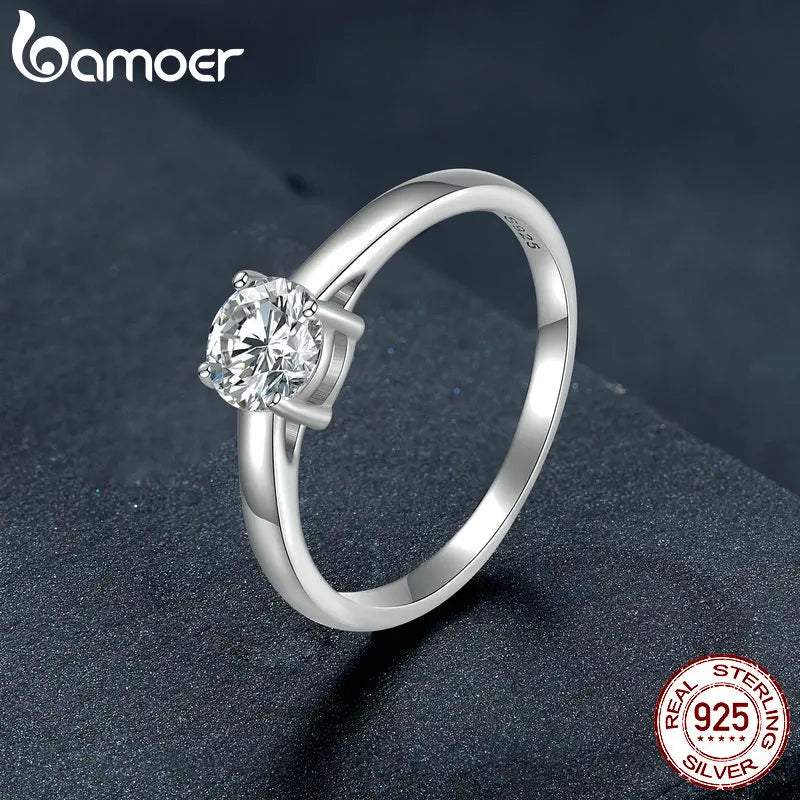 0.6 Carat Round Moissanite Engagement Ring – Platinum Plated 925 Sterling Silver Solitaire with 4-Prong Setting for Women