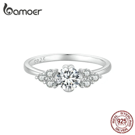 0.5 Carat Round Moissanite Engagement Ring – D Color VVS1 Stone with CZ Accents on 925 Sterling Silver Band for Women