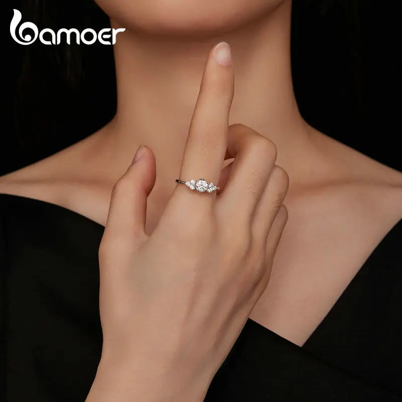 0.5 Carat Round Moissanite Engagement Ring – D Color VVS1 Stone with CZ Accents on 925 Sterling Silver Band for Women